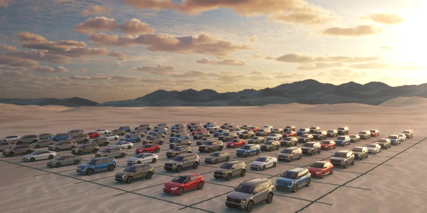 Grid of Kia cars in the desert