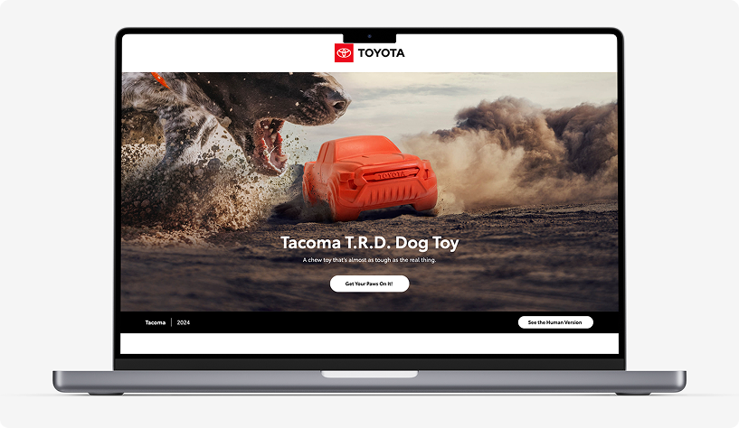 Toyota Dog Toy website landing page on a laptop